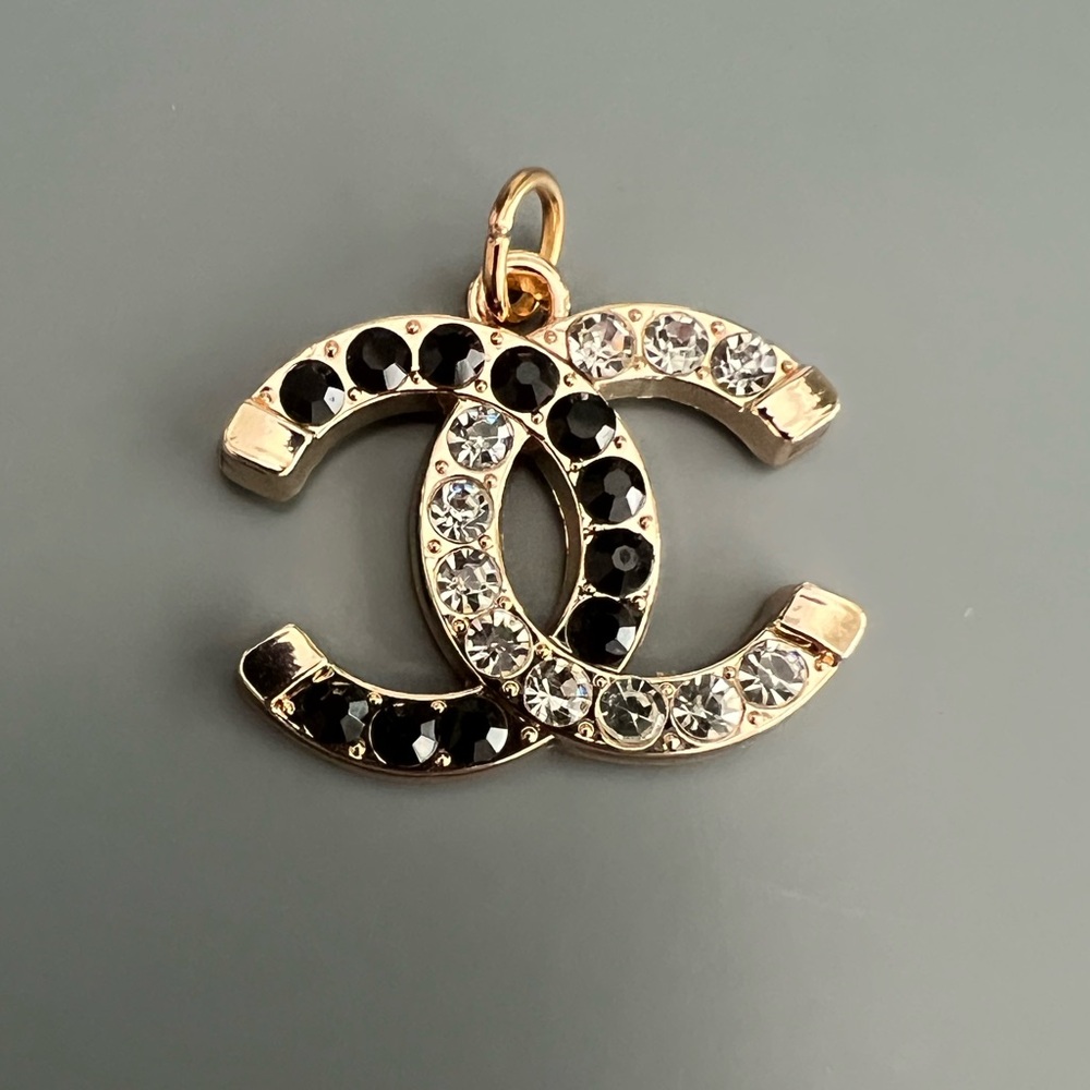 CHANEL Gold and Black Pendant